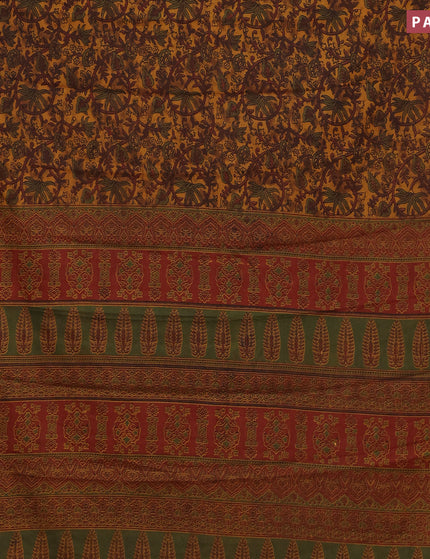 Muslin cotton saree dark mustard and maroon with allover floral prints and small zari woven border