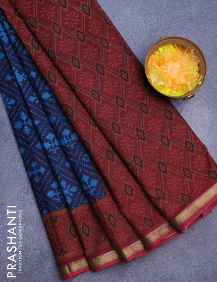 Muslin cotton saree navy blue and maroon with allover ikkat prints and small zari woven border