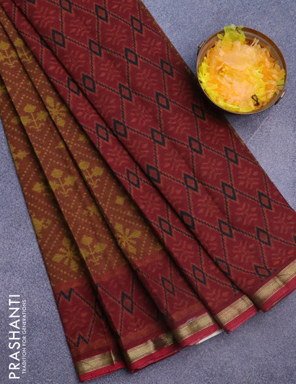 Muslin cotton saree rustic brown and maroon with allover ikkat prints and small zari woven border