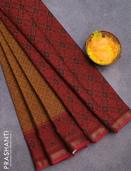 Muslin cotton saree rustic brown and maroon with allover ikkat prints and small zari woven border