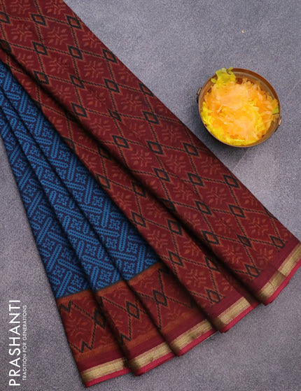 Muslin cotton saree navy blue and maroon with allover ikkat prints and small zari woven border