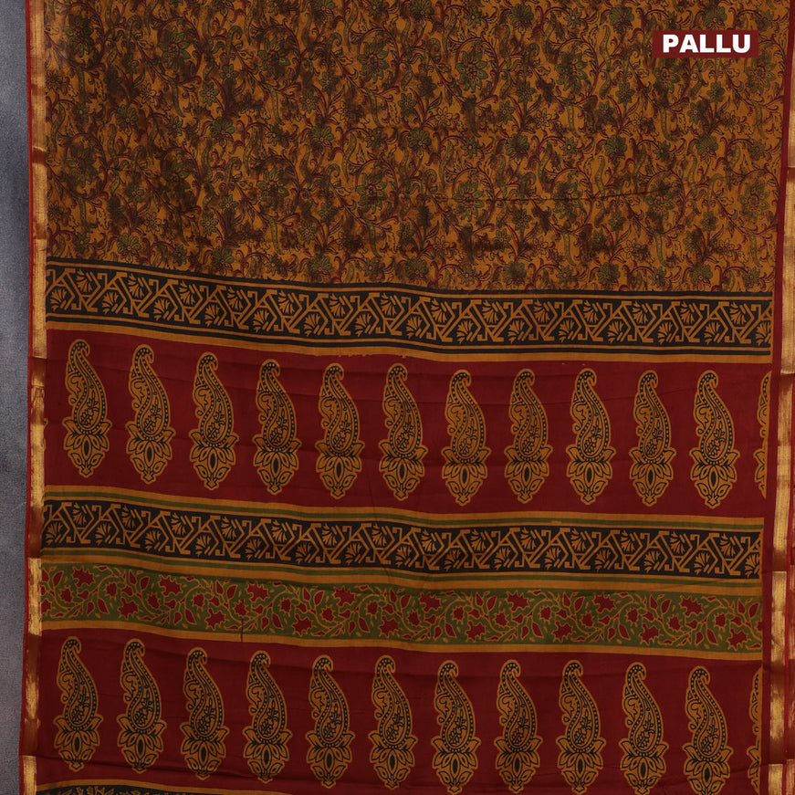 Muslin cotton saree dark mustard and maroon with allover floral prints and small zari woven border