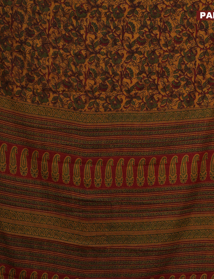 Muslin cotton saree dark mustard and maroon with allover floral prints and small zari woven border