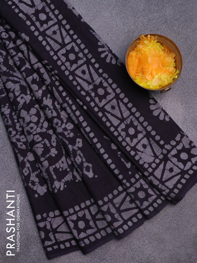 Muslin cotton saree navy blue and grey with allover batik prints and printed border