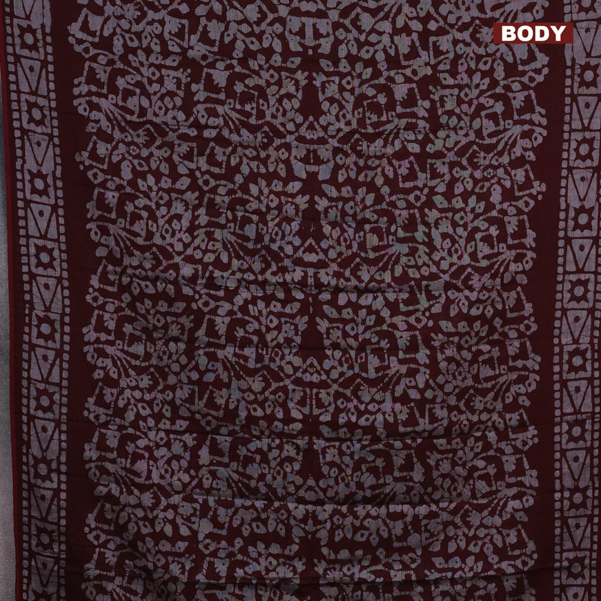 Muslin cotton saree dark maroon and grey with allover batik prints and printed border