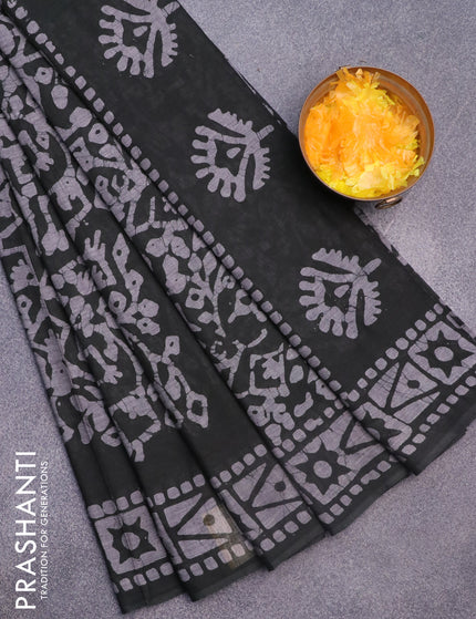 Muslin cotton saree bottle green and grey with allover batik prints and printed border