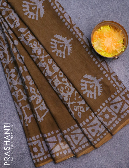 Muslin cotton saree dark mustard and grey with allover batik prints and printed border