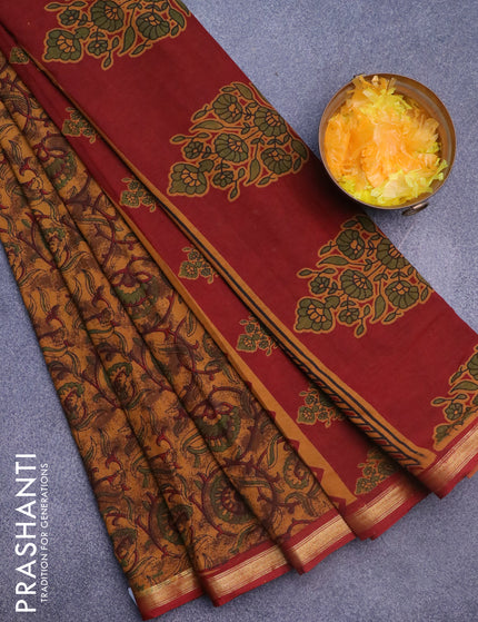 Muslin cotton saree dark mustard and maroon with allover floral prints and small zari woven border