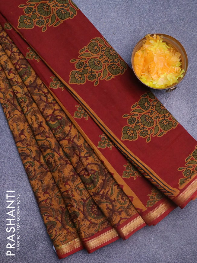 Muslin cotton saree dark mustard and maroon with allover floral prints and small zari woven border