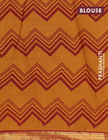 Muslin cotton saree dark mustard and maroon with allover floral prints and small zari woven border