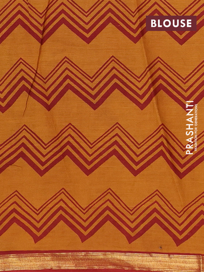 Muslin cotton saree dark mustard and maroon with allover floral prints and small zari woven border