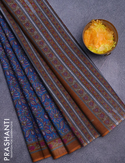 Muslin cotton saree cs blue and dark mustard with allover floral prints and printed border