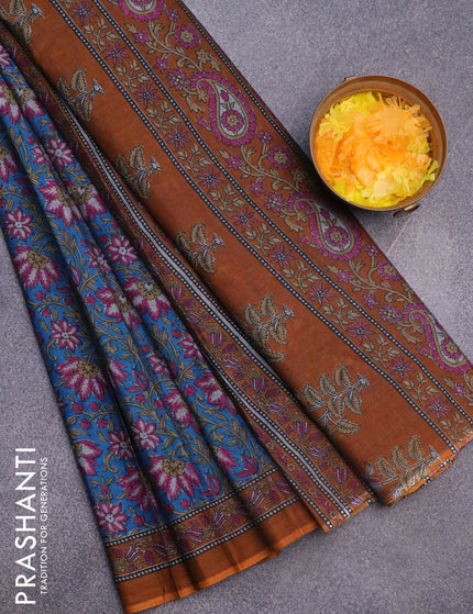 Muslin cotton saree cs blue and dark mustard with allover floral prints and printed border