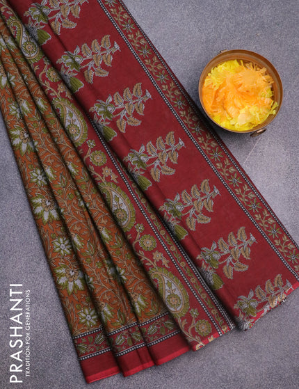 Muslin cotton saree dark mustard and maroon with allover floral prints and printed border