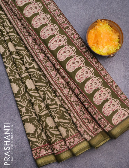 Muslin cotton saree sap green with allover floral prints and small zari woven border