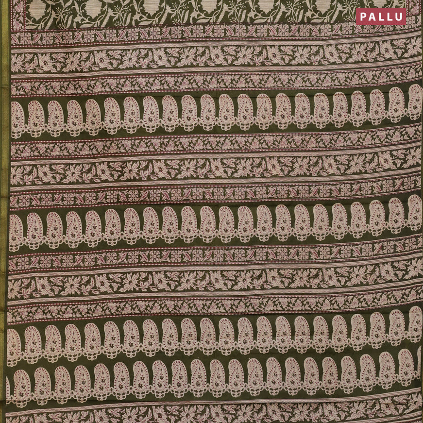 Muslin cotton saree sap green with allover floral prints and small zari woven border