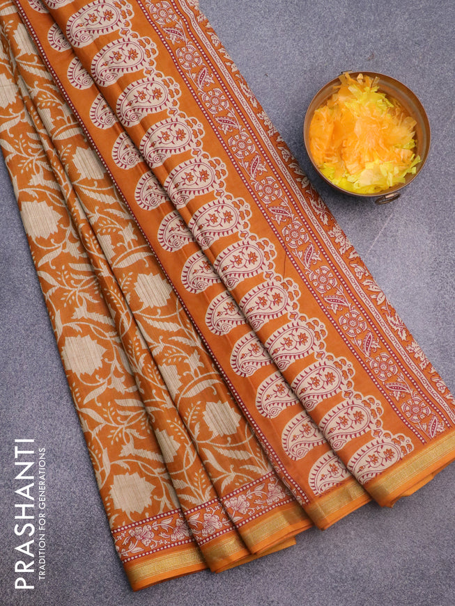 Muslin cotton saree dark mustard with allover floral prints and small zari woven border