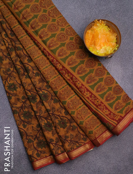 Muslin cotton saree dark mustard and maroon with allover floral prints and small zari woven border