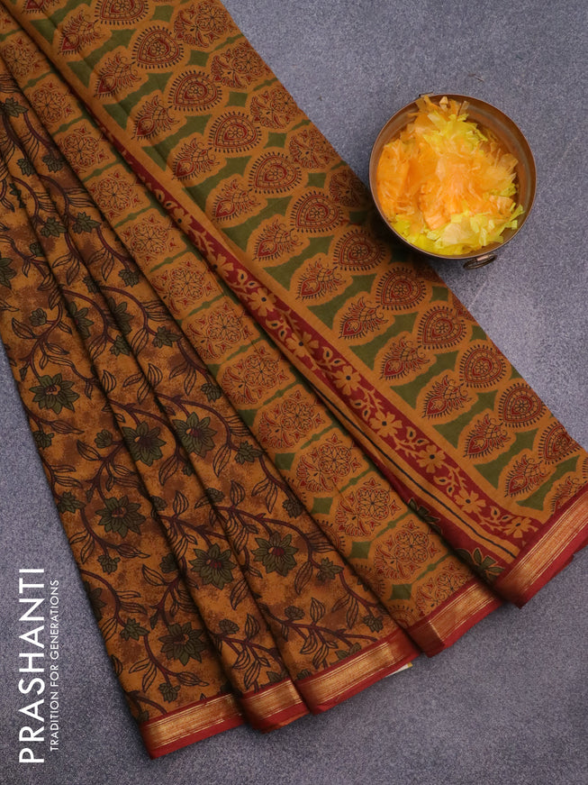 Muslin cotton saree dark mustard and maroon with allover floral prints and small zari woven border