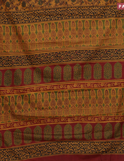 Muslin cotton saree dark mustard and maroon with allover floral prints and small zari woven border