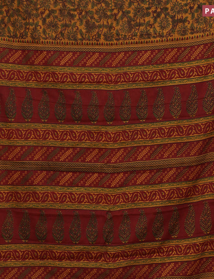 Muslin cotton saree dark mustard and maroon with allover floral prints and small zari woven border