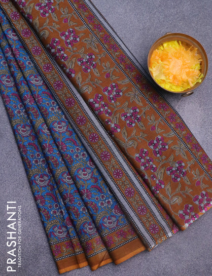 Muslin cotton saree cs blue and dark mustard with allover floral prints and printed border