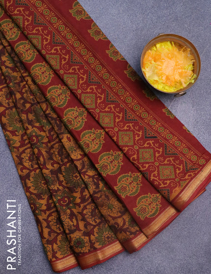 Muslin cotton saree dark mustard and maroon with allover floral prints and small zari woven border