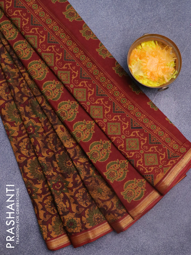 Muslin cotton saree dark mustard and maroon with allover floral prints and small zari woven border