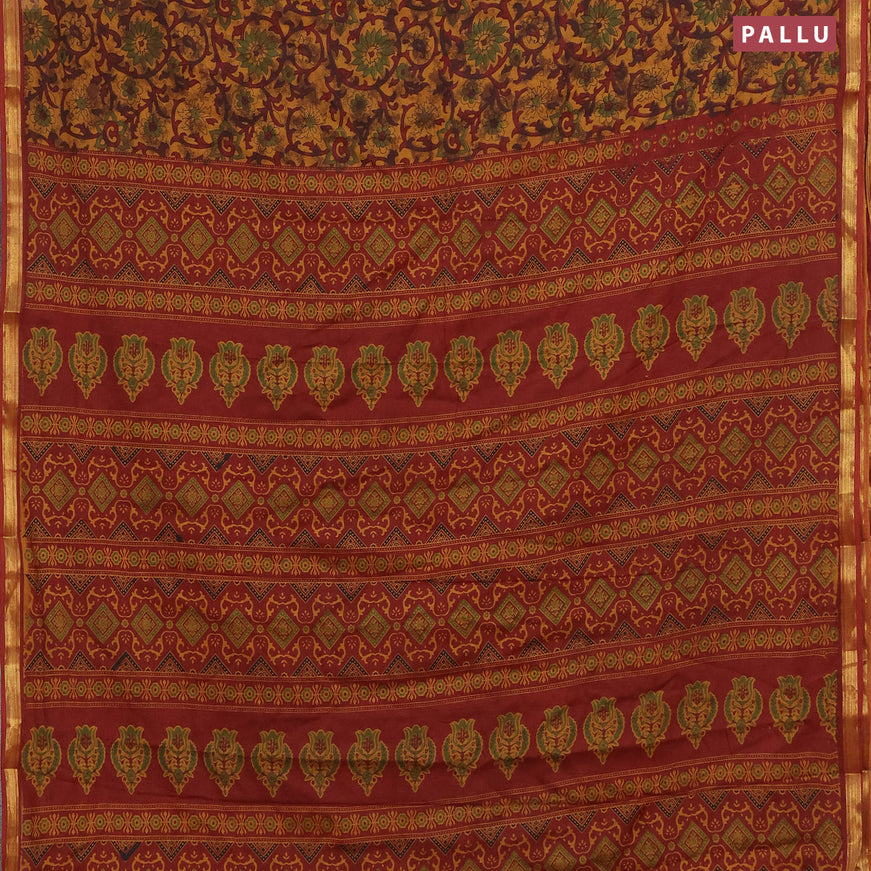 Muslin cotton saree dark mustard and maroon with allover floral prints and small zari woven border