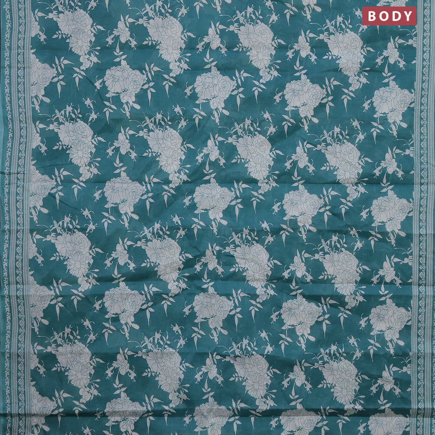 Muslin cotton saree teal blue and off white with allover floral prints and printed border