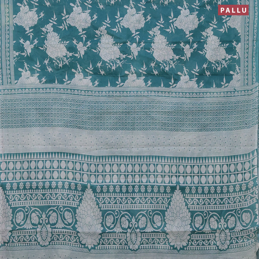 Muslin cotton saree teal blue and off white with allover floral prints and printed border