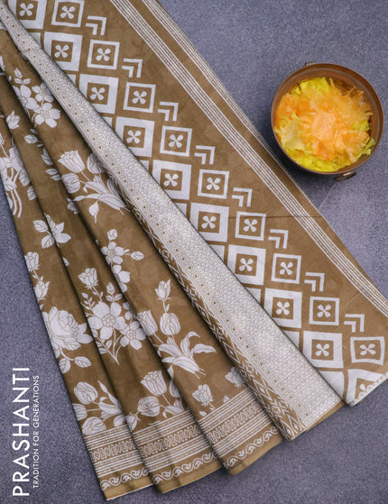 Muslin cotton saree khaki shade and off white with allover floral prints and printed border