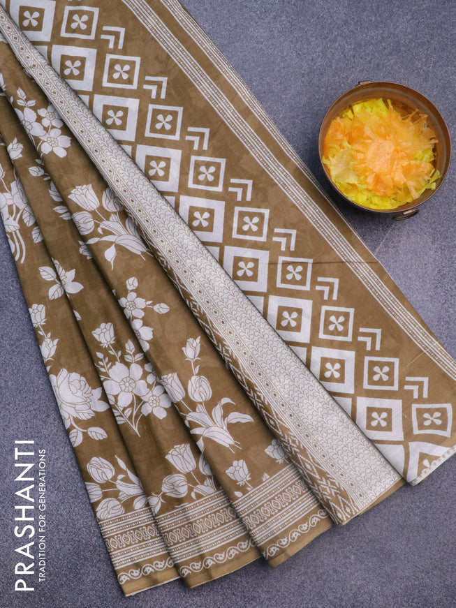 Muslin cotton saree khaki shade and off white with allover floral prints and printed border