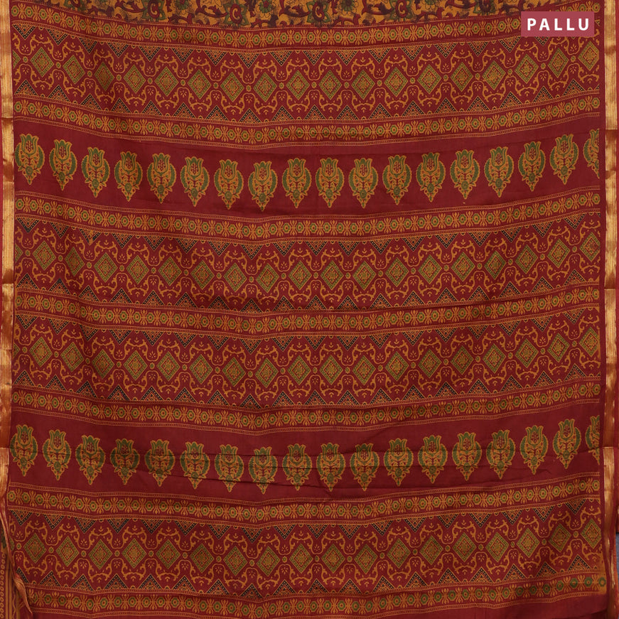 Muslin cotton saree dark mustard and maroon with allover floral prints and small zari woven border