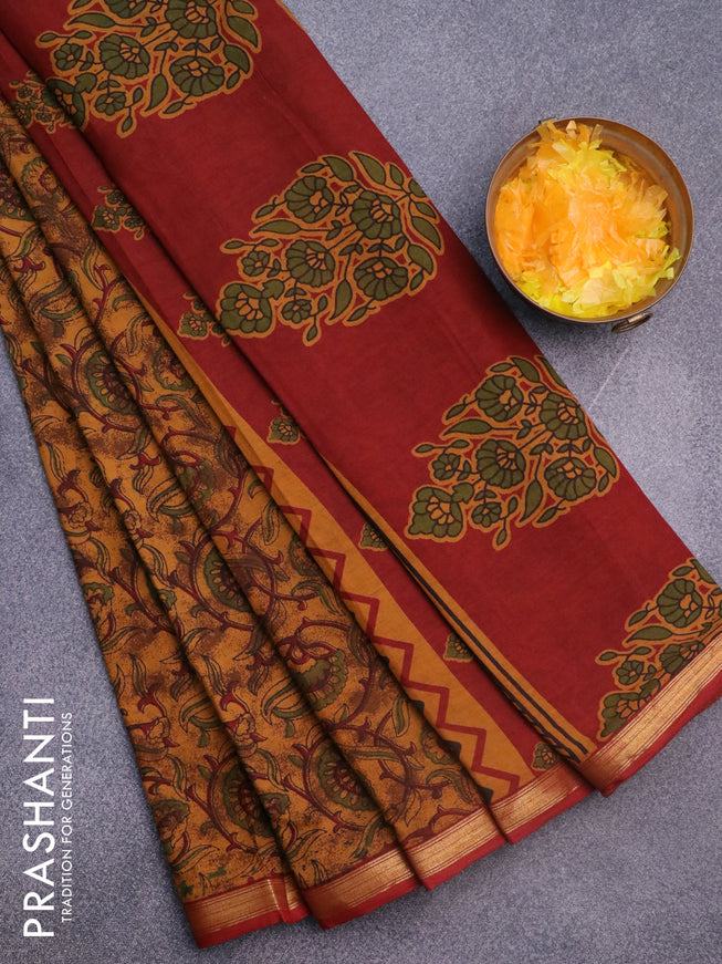 Muslin cotton saree dark mustard and maroon with allover prints and small zari woven border