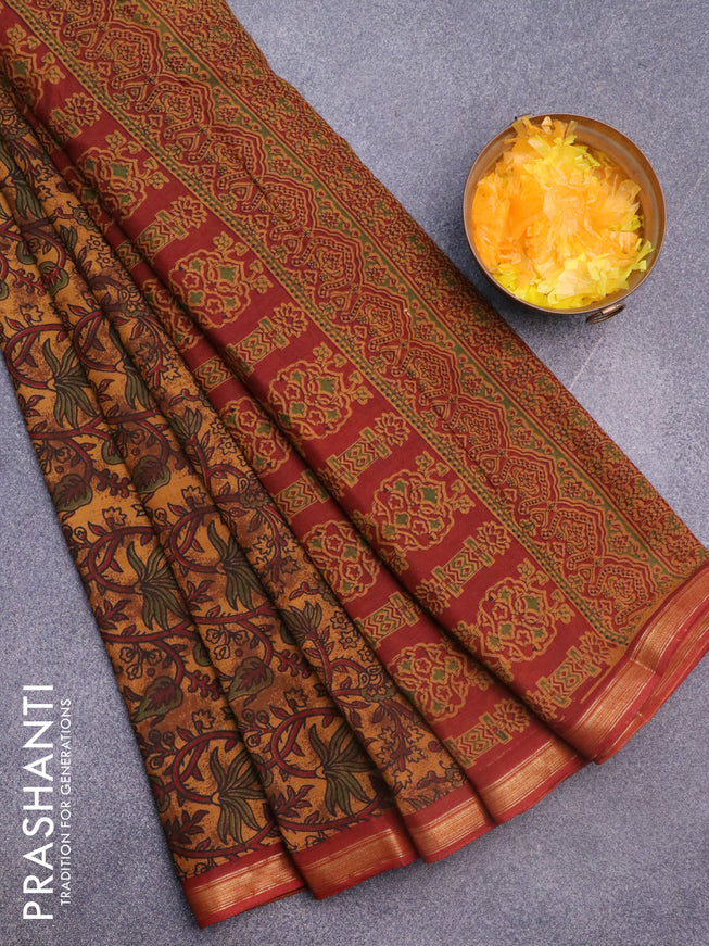 Muslin cotton saree dark mustard and maroon with allover floral prints and small zari woven border