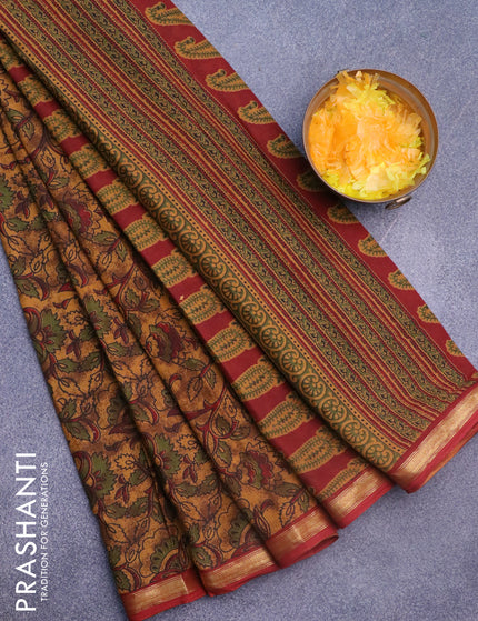 Muslin cotton saree dark mustard and maroon with allover floral prints and small zari woven border