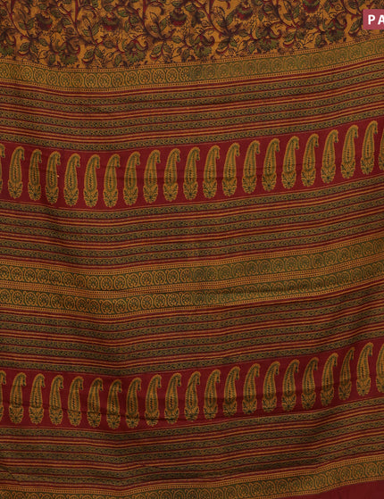 Muslin cotton saree dark mustard and maroon with allover floral prints and small zari woven border