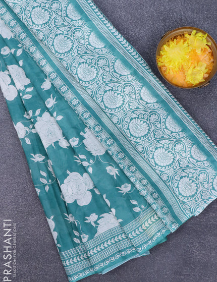 Muslin cotton saree teal green shade and off white with allover floral prints and printed border