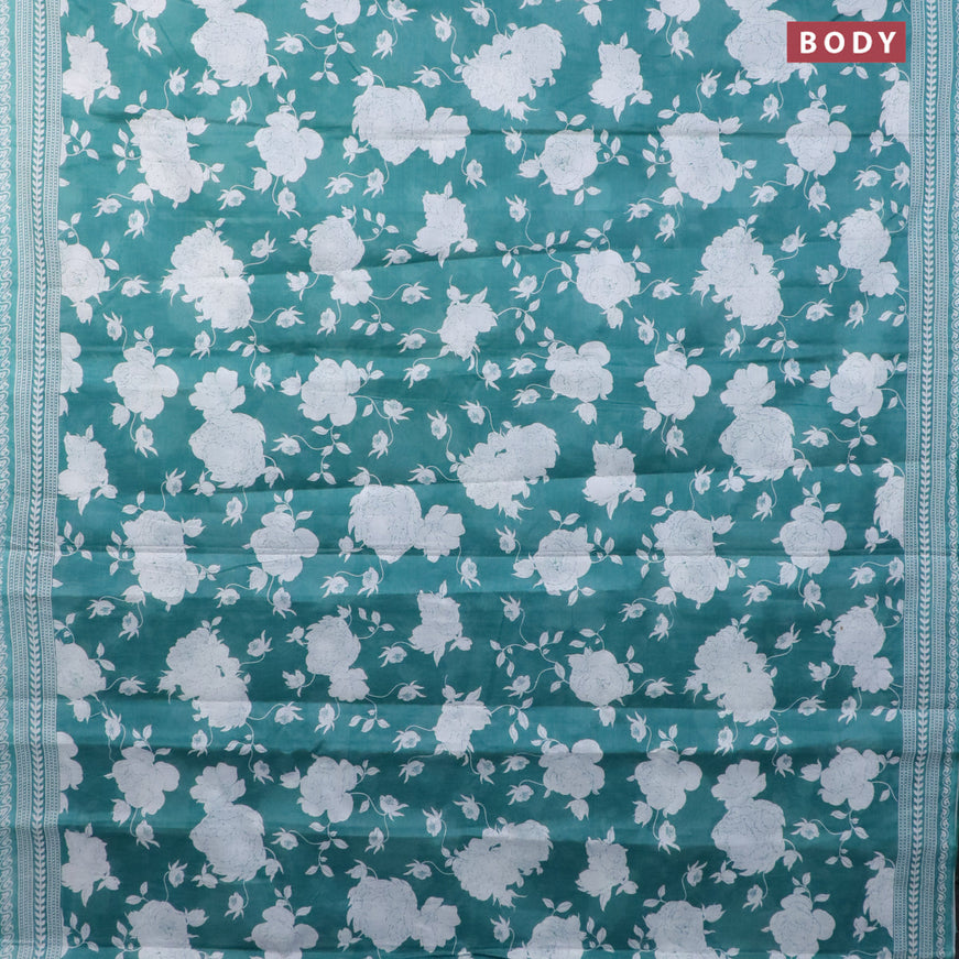 Muslin cotton saree teal green shade and off white with allover floral prints and printed border