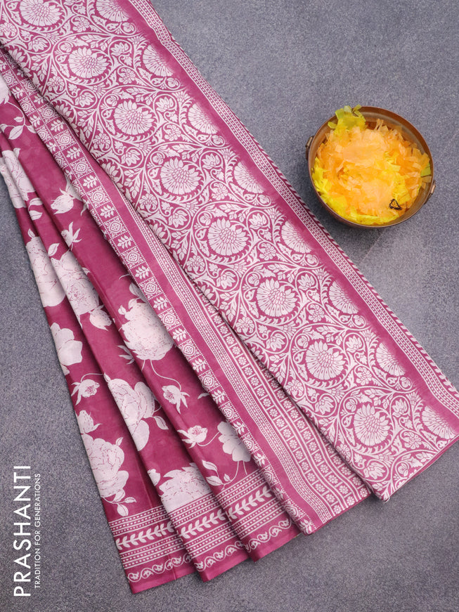 Muslin cotton saree magenta pink and off white with allover floral prints and printed border