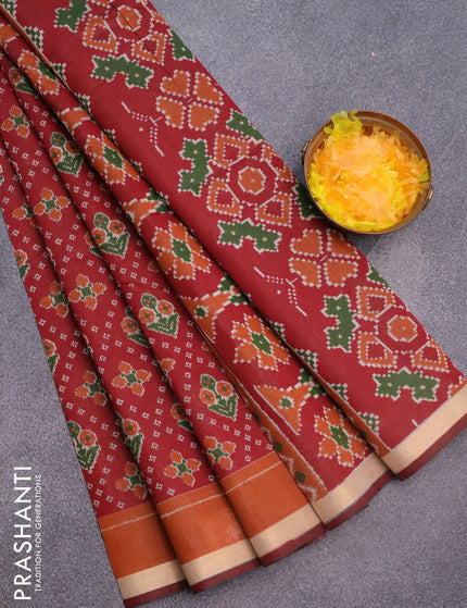 Muslin cotton saree maroon and rust shade with allover ikkat prints and small zari woven border