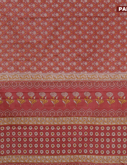 Muslin cotton saree peach shade with allover prints and printed border