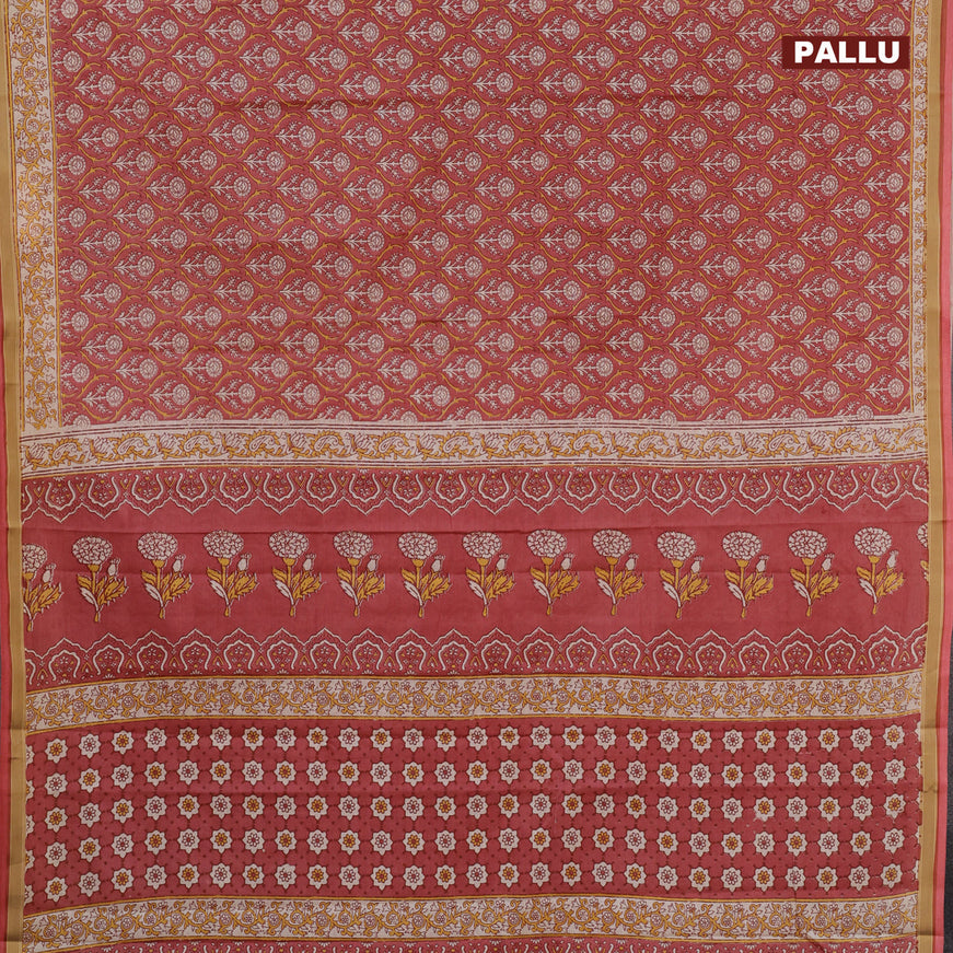 Muslin cotton saree peach shade with allover prints and printed border