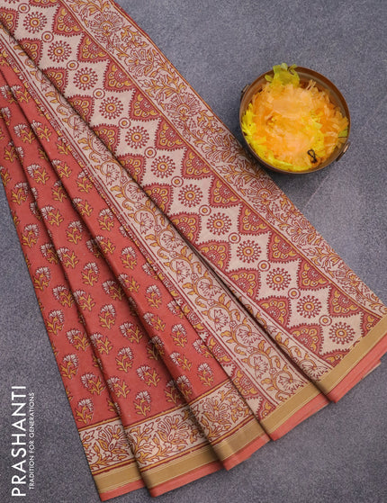 Muslin cotton saree peach shade with allover floral butta prints and printed border