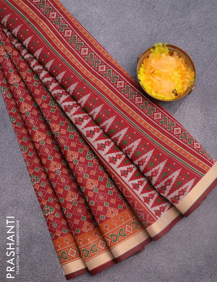 Muslin cotton saree maroon and rustic orange with allover ikkat prints and small zari woven border