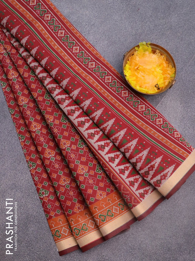 Muslin cotton saree maroon and rustic orange with allover ikkat prints and small zari woven border