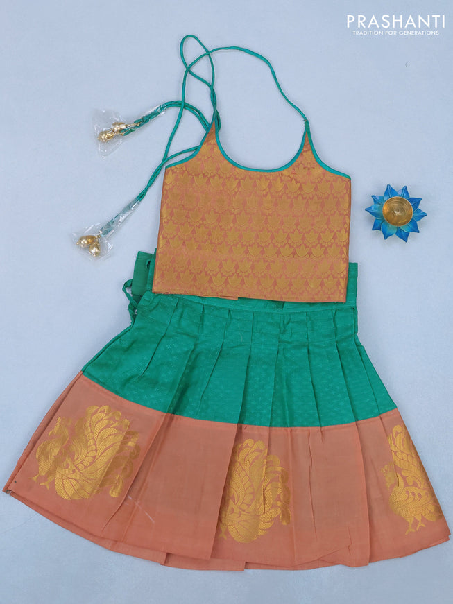 Silk kids lehenga pastel peach and teal green with zari woven brocade weaves and back knot & zari woven butta border for 1 year