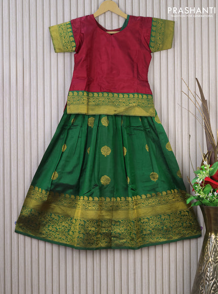 Silk kids lehenga maroon and green with plain body and long zari woven border for 8 years