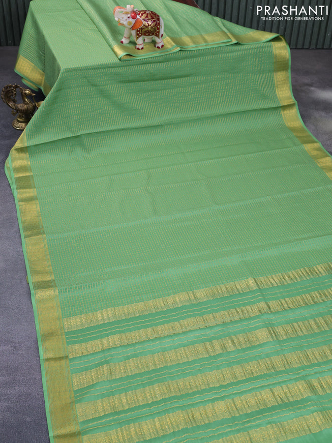 Pure mysore silk saree light green with allover zari checked pattern and zari woven border